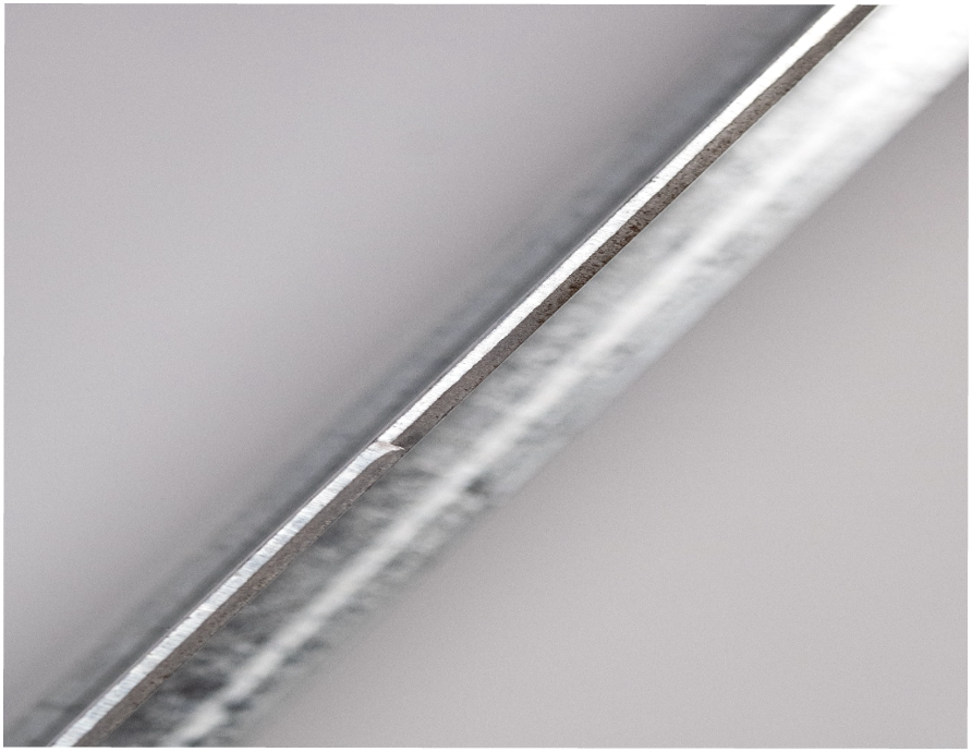 Figure 3 Punched edge- roller deburr close-up